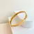 Bracelete Cartier com zircônias em aço inoxidável dourado - comprar online
