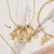 Colar pingente filho(a) em berloque semijoia em Ouro 18k - comprar online
