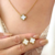 Conjunto trevo unitário em aço inoxidável dourado - comprar online