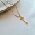 Colar pingente chave cravejada zircônia color semi joia em ouro 18K na internet