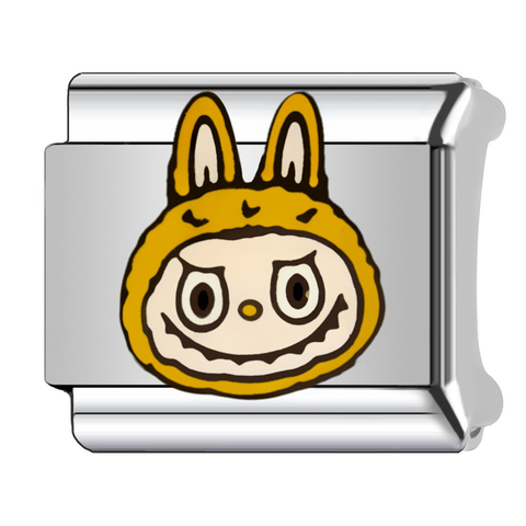 Charm figura popular amarilla