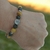 Pulsera Palo Santo, Pirita y dije de San Benito "Protección, Abundancia, Bienestar emocional" - comprar online