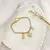 PULSEIRA DOURADA FECHO IMÃ CORAÇÃO ESP.SANTO INICIAL