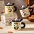 Taza ceramica panda + tapa + cucharita