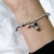 PULSERA CON IMAN ASTRNAUTA/OSITO - tienda online