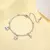 Cazador estrela do mar concha encantos pulseira feminina de aço inoxidável ver - loja online