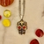 Catrina, con cadena