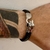 Pulsera Snake, acero y cuero en internet