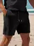 Um conjunto de duas peças de shorts de verão masculino de alta qualidade e top