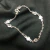 PULSEIRA DE PRATA 6 ZIRCONIAS DUPLAS