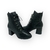 Bota feminina coturno em couro texturizado preto com salto bloco de 7cm.