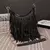 Bolsa Crossbody Franjas na internet