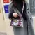 The Snaked Bolsa Crossbody