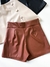 Shorts Saia Feminino em Courino com Fenda e Botões Poliana Ref. 1483 Tamanho:M;Cor:Preto