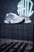 Tênis New Balance 9060 – Cinza com Branco e Detalhes Rosados na internet