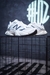 Tênis New Balance 9060 – Branco com Azul Marinho e Detalhes Cinza na internet