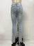Calça Jeans de cintura diagonal rasgada para mulheres