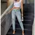 Calça Jeans de cintura diagonal rasgada para mulheres na internet
