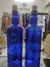 Botellas de vidrio azul - agua solarizada