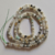 Tira rondelle facetada cuarzo rutilado verde 3x2mm - comprar online