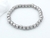 Pulsera plateada cuentas talladas 6mm