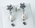 Aros plateados colgantes flores
