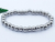 Pulsera elástica de acero quirúrgico de bolitas
