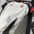 Camisa Flamengo Branca 2025/2026 – Torcedora Raiz (Feminina) - Sua Camisa Raiz