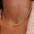 Choker Riviera Dourado na internet