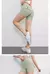 Shorts de fitness de pêssego para mulheres, calças 3/4, bolso com ar seco, elevador apertado de ioga, verão - loja online