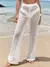 Saída de praia calça larga elegante moda feminina... na internet