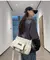Bolsa crossbody unissex despojada na internet