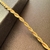 Pulseira Torcida Dourada – Banho de Ouro 18K