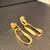 Brinco Gota Torcida – Banho de Ouro 18k - comprar online