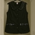 Delantal negro con detalles en lunares blancos