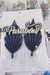 Topo de bolo em papel com o nome parabéns na cor prata, em conjunto traz dois ornamentos em formato de folhas com efeito sanfonado 3D, unidos por um elegante recorte escrito “Parabéns” em letra cursiva dourada e sobreposta com acabamento detalhado.

