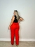 CALÇA COM ELASTICO NAS COSTAS E DETALHE EM AMARRAR na internet