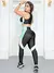 Conjunto de Academia Fitness Feminino com Cropped Sem Bojo e Calça com Recorte Colorido