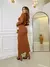 Conjunto de Saia Maxi Midi com fenda frontal e Blusa Gola Alta Cacharrel manga longa - comprar online