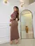 Conjunto de Saia Maxi Midi com fenda frontal e Blusa Gola Alta Cacharrel manga longa - comprar online