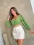 Cropped com manga longa/Blusa/Com botao lastex/Liso