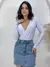Body Feminino Manga Longa Bojo Frente Transpassada Marquezine na internet