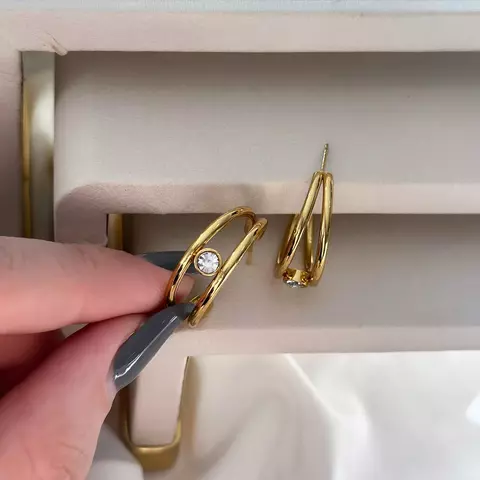 Argola de aço inoxidável com ponto de luz zircônia - comprar online