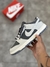 Imagem do NIKE DUNK SB CINZA