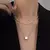 GeoCharm Duo – Colar Feminino Prateado com Design Geométrico e Corrente Dupla Fashion - comprar online