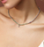Riviera Sy Joia em Ouro Champagne 18k com Diamantes e Esmeralda