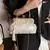 Bolsa Clutch Floral Elegante - comprar online