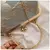 Bolsa Clutch Floral Elegante na internet