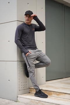 Pantalon Deportivo Tech Gris Melange en internet