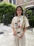 Remera Cool Items Crema